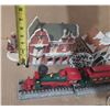 Image 5 : Collection of miniature Christmas village buildings, figurines, a train set, and a "Village Skating 