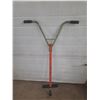 Image 1 : Vintage pogo stick from around the 1970s, similar to the retro jumping sticks made by brands like RA