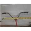 Image 4 : Vintage pogo stick from around the 1970s, similar to the retro jumping sticks made by brands like RA