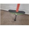 Image 5 : Vintage pogo stick from around the 1970s, similar to the retro jumping sticks made by brands like RA
