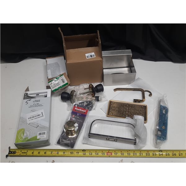 Assortment of home hardware items, including door knobs, lockset, a drop-in- floor register, etc. (E