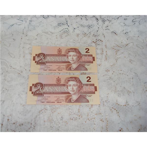 Pair Of Canadian $2.00 Bills   Appear Unused  One Hundred Apart  See Serial Numbers