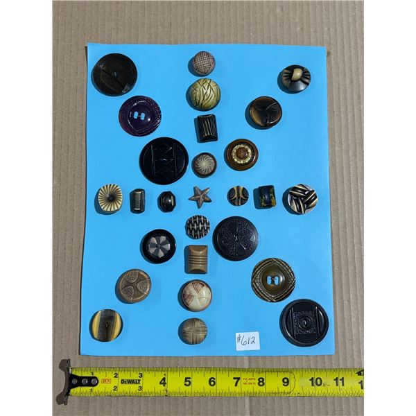 Collage of celluloid buttons
