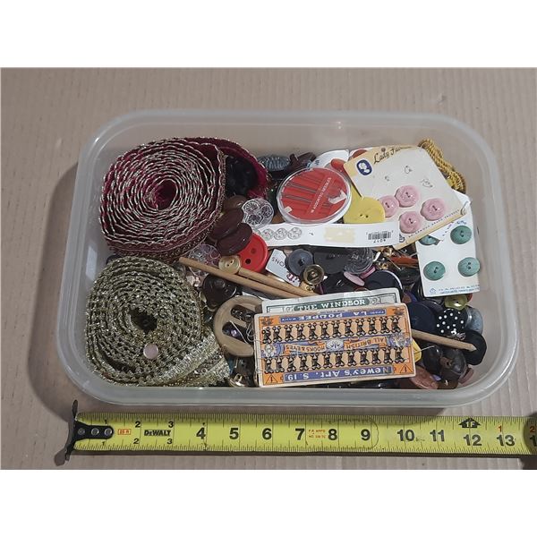 Container of vintage buttons and trims