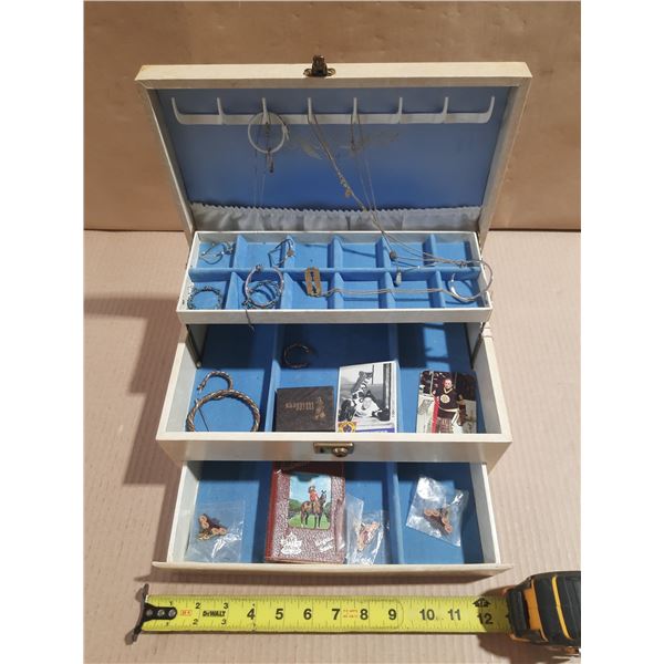 Vintage jewelry box with contents