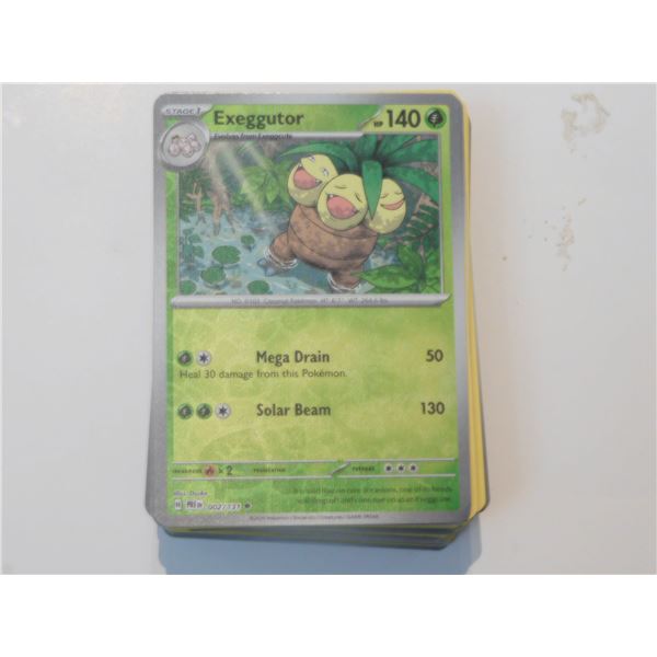 STACK OF MIXED POKEMON CARDS