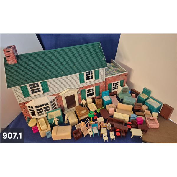Large 1950s tin Marx child's toy house - tons of original furniture. Is in exceptional condition.