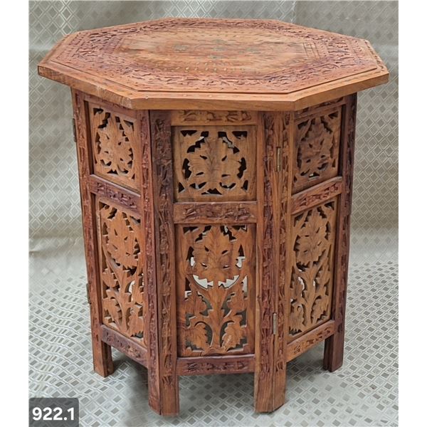 Heavy hand-carved fold-up teak MCM side table