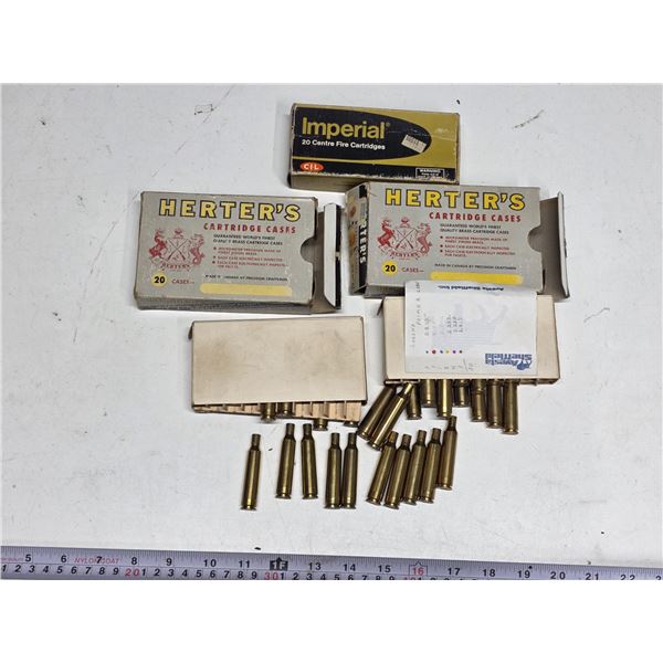2 herters cartridges cases- 6mm rem primed- brass 40 total