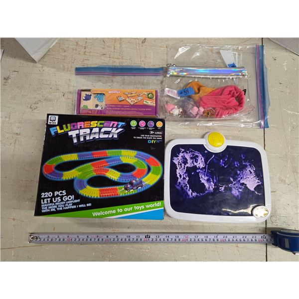 Assorted Toy Lot inc. Box of Fluorescent Racetrack Pieces