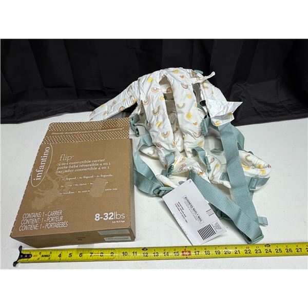 Infantino Flip 4-in-1 Convertible Carrier in a rainbow pattern. (New)