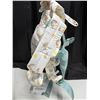 Image 4 : Infantino Flip 4-in-1 Convertible Carrier in a rainbow pattern. (New)