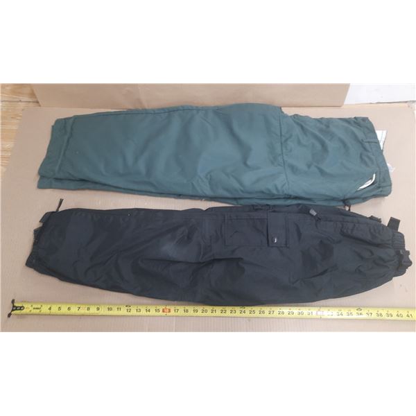 Green Husqvarna Leg Protection Pant - Length 42", Waist 48-50, and Black Wetskins Pant Size S/P (Bla