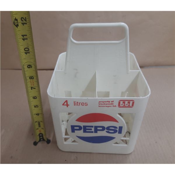 Vintage white plastic Pepsi bottle carrier, specifically a 4-litre (4-pack or multi-bottle).