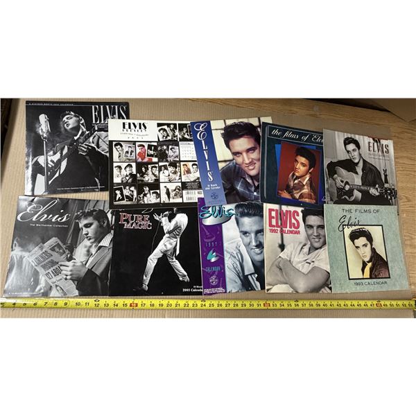 Collection of vintage Elvis Presley calendars and mini booklets from various years, including 1992, 