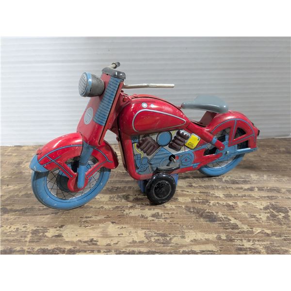 Vintage wind up toy motorbike