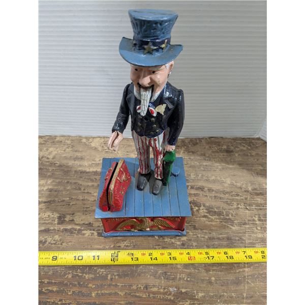 Vintage cast iron coin bank, Banker