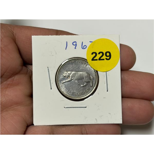 1967 Canada Silver 25 Cents.