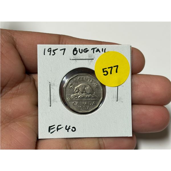 1957 Bug Tail Nickel 5 Cents. There is a small Die Chip on the end of the Beaver’s Tail tha