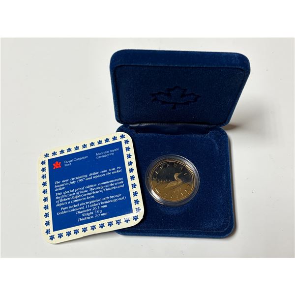 1987 Proof Loonie Dollar. This is the first year of the Loonie Dollar. Proof with Ultra Heavy Cameo.
