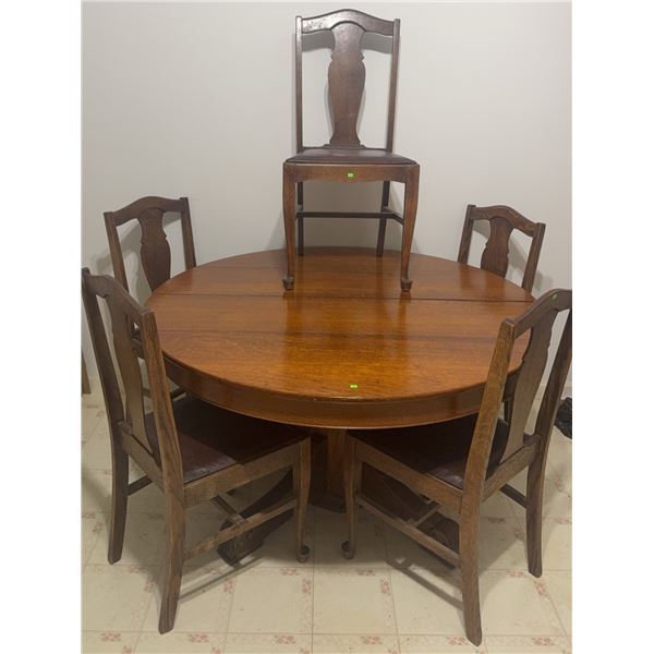 Round Oak Dining Table with Pedestal Base and Five Matching Chairs