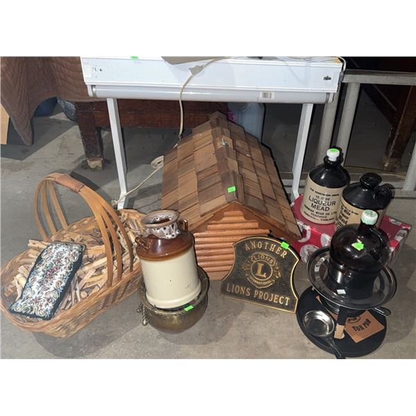 Household Items Including Wooden House, Lions Project Plaque, and Basket