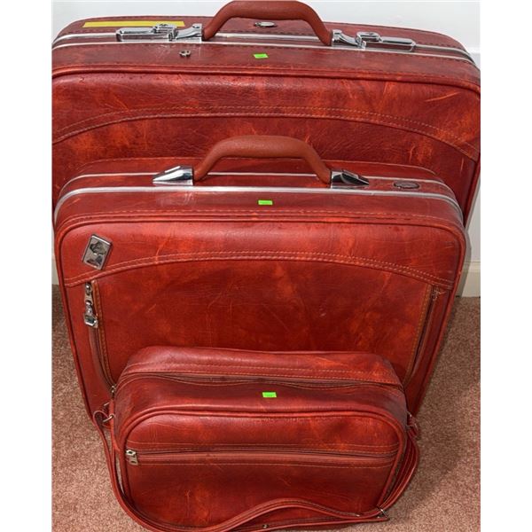 Three-Piece Red Faux Leather Luggage Set with Silver-Tone Hardware