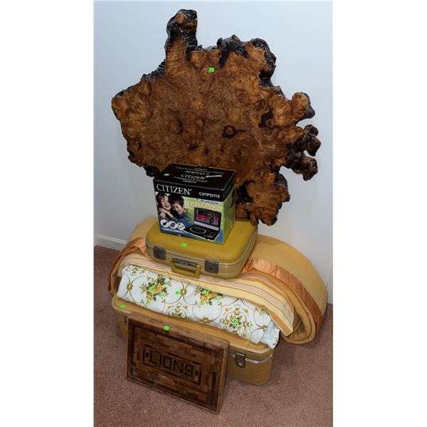 Lot with Citizen 7" Portable DVD Player, Yellow Suitcases, Burl Wood Slab, Lions Plaque, and Linens