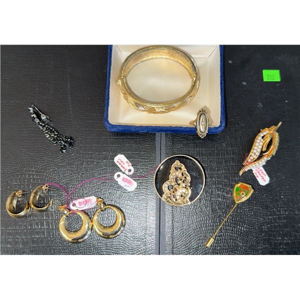 Gold Tone Jewelry Including Bangle, Earrings, Brooches, and Stick Pin