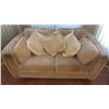 Image 1 : Beige Upholstered Loveseat With Four Cream Patterned Throw Pillows