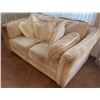 Image 2 : Beige Upholstered Loveseat With Four Cream Patterned Throw Pillows