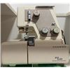 Image 11 : Janome Sewing Machine, Janome Serger, L-Shaped Sewing Cabinet, Accessories Included