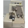 Image 14 : Janome Sewing Machine, Janome Serger, L-Shaped Sewing Cabinet, Accessories Included