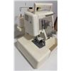 Image 16 : Janome Sewing Machine, Janome Serger, L-Shaped Sewing Cabinet, Accessories Included