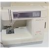 Image 6 : Janome Sewing Machine, Janome Serger, L-Shaped Sewing Cabinet, Accessories Included