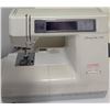 Image 7 : Janome Sewing Machine, Janome Serger, L-Shaped Sewing Cabinet, Accessories Included