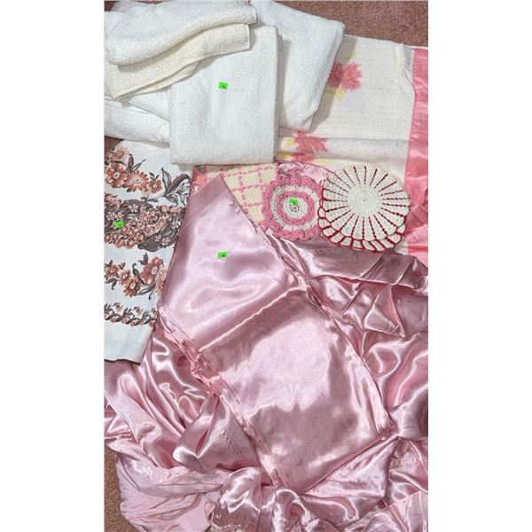 Linens Including Pink Satin, Floral Print, Crochet, and Terrycloth Towels