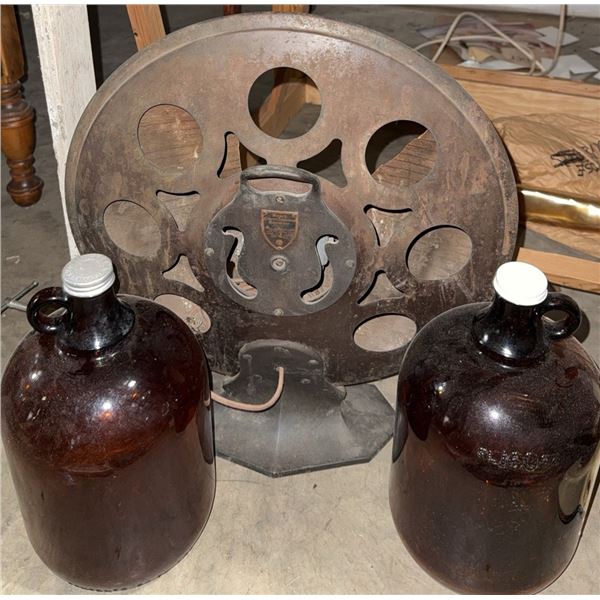 Film Reel with Stand, Two Brown Glass Jugs and Electric Grinder Base with Cords