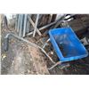 Image 5 : Building Materials and Tools Under Compound Including Wheelbarrow, Lumber, Pipes