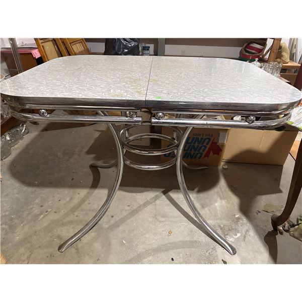 Chrome Table with Grey Patterned Laminate Top and Curved Legs