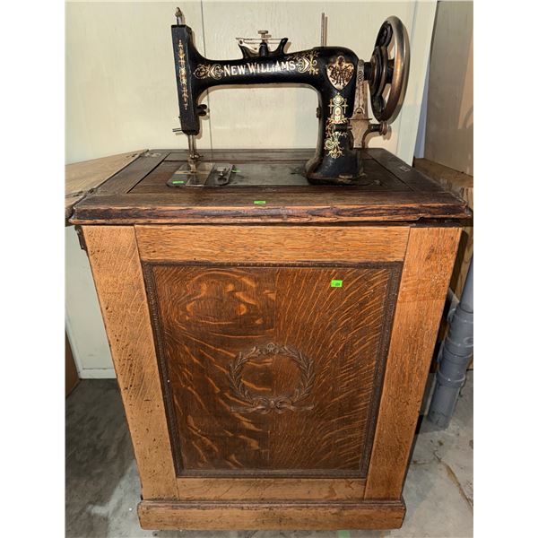 New Williams Treadle Sewing Machine in Oak Cabinet with Drawers