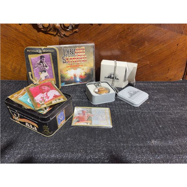 Muhammad Ali Collectible Lot with Cards, Tin, Necklace, Skynyrd CD, Pocket Watch