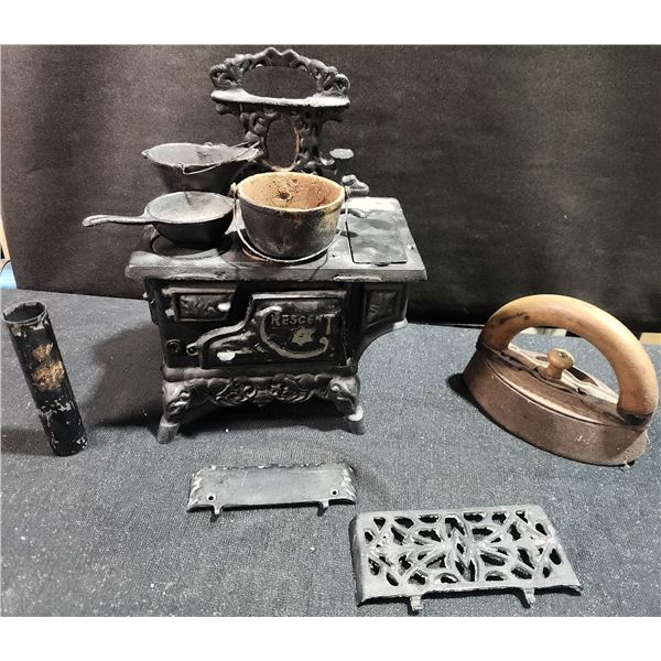 Cast Iron Toy Stove With Accessories and Miniature Iron, Early 20th Century