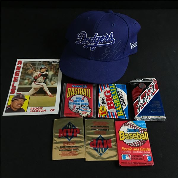 LOT OF BASEBALL MEMORABILIA INCLUDING SIGND HAT AND SEALED TRADING CARD PACKS