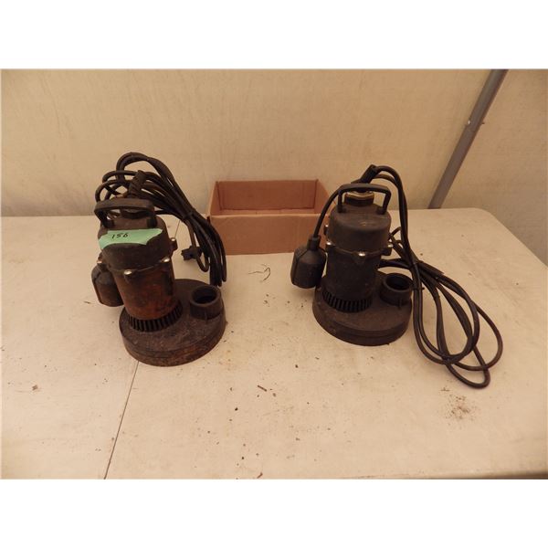 2 used submersible pumps