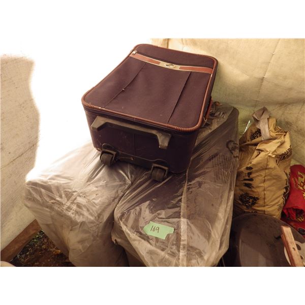lot of three suitcases
