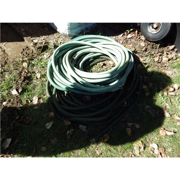 Two rolls of garden hose