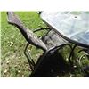 Image 2 : Oval glass  topped patio table and 4 chairs
