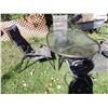 Image 6 : Oval glass  topped patio table and 4 chairs