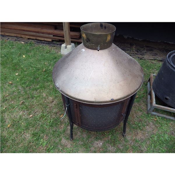 shop built lawn fire pit using dryer tub has metal topper